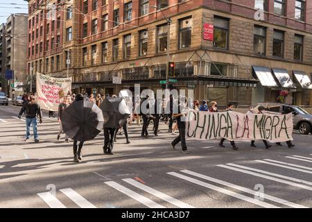 Seattle, USA. 25th Sep, 2021. Late in the day protestors at the Chinga La Migra Anti-Ice march. Stock Photo