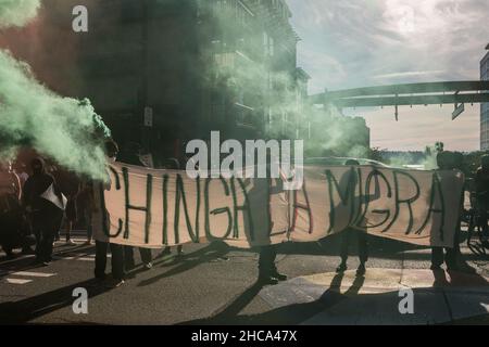 Seattle, USA. 25th Sep, 2021. Late in the day protestors setting off smoke grenades at the Chinga La Migra Anti-Ice march. Stock Photo