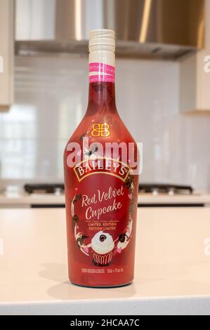 Calgary, Alberta - December 26, 2021:  Bottle of Bailleys Red Velvet Cupcake in a modern kitchewn. Stock Photo