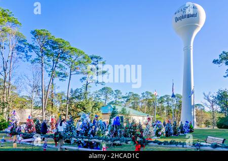 Christmas trees decorate Water Tower Plaza, Dec. 24, 2021, in Dauphin Island, Alabama. Stock Photo