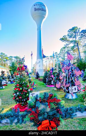 Christmas trees decorate Water Tower Plaza, Dec. 24, 2021, in Dauphin Island, Alabama. Stock Photo