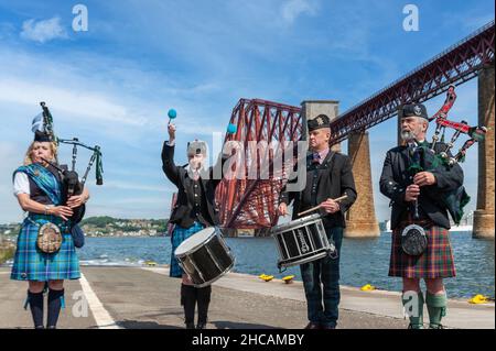 Bagpipe and drummer player welcome cruise ship. Stock Photo