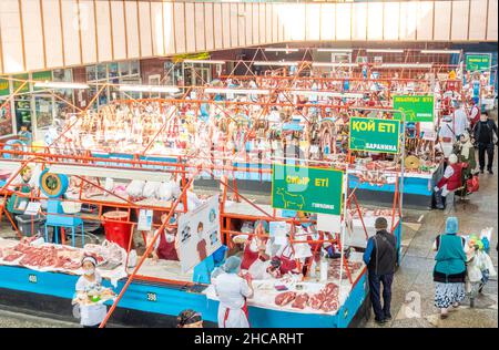 Meat section overview- Green bazaar bazar market- the largest and oldest indoor marketplace in Almaty, Kazakhstan Stock Photo