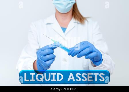 Sign displaying Liquid Assets. Internet Concept Cash and Bank Balances Market Liquidity Deferred Stock Preparing Medical Vaccine Presenting New Stock Photo