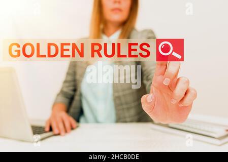 Writing displaying text Golden Rules. Business approach Basic principle that should be followed Important Principle Giving New Hires Company Stock Photo