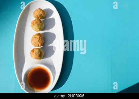 Traditional Gujarati snack item called Lilva Kachori, made of Fresh tuvar or Pigeon peas filled inside Kachori. Winter special indian appetizer snack Stock Photo