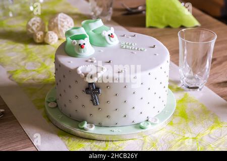 The inscription on cake Baptism beautiful children's cake Culinary desserts art cooking baptize sweet dishes. Stock Photo