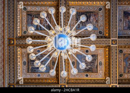 Chandelier and ceiling in Hall of the Captains in Palazzo dei Conservatori, Capitoline Museums, Rome, Italy, view from directly below. Stock Photo