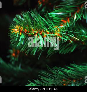 Artificial needles on a synthetic Christmas tree. Artificial Christmas tree Stock Photo