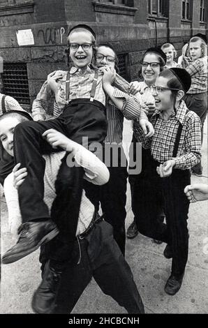 Orthodox Jewish boys at play in Williamsburg, Brooklyn, New York, circa 1975. Stock Photo