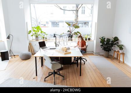 Laptop and computer on office desk Stock Photo