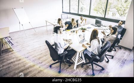 Young people employee coworkers at business meeting in urban coworking place studio - Human resources concept at working time - Start up entrepreneurs Stock Photo