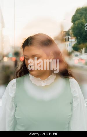 Double exposure of young plus size woman Stock Photo