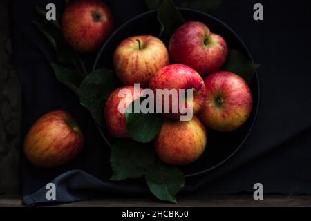 Studio shot of bowls of fresh porridge with Gala apples Stock Photo