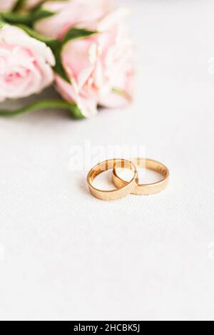 Engagement ring pair wedding rings flat laid against pink background hi-res  stock photography and images - Alamy