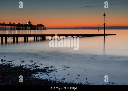 Jetty and pier at dawn on Llandudno North Shore, North Wales Stock Photo