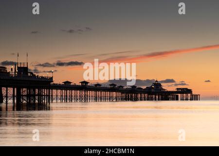 Pier at dawn on Llandudno North Shore, North Wales Stock Photo
