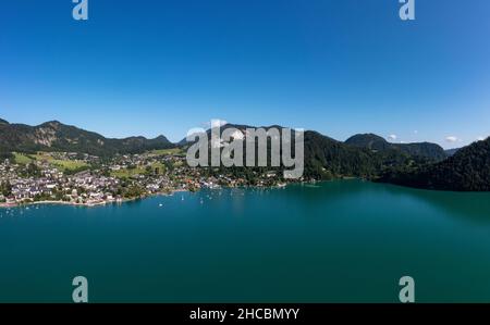 Austria, Salzburg, Saint Gilgen, Drone view of clear sky over Lake Wolfgang in summer with village in background Stock Photo