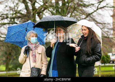 Hagley, Worcestershire, UK. 27th Dec, 2021. Three generations from the same family turn out in the rain for the first hunt at Hagley Hall since the Coronavirus pandemic. The Albrighton and Woodland Hunt meet annually at Hagley Hall in Worcestershire. Credit: Peter Lopeman/Ģ����ý Live News Stock Photo