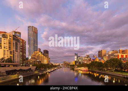 Australia, Melbourne, Victoria, Cloudy sky over Yarra River canal in Southbank at dusk Stock Photo