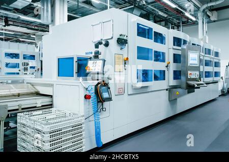 Automated machine at electrical industry Stock Photo