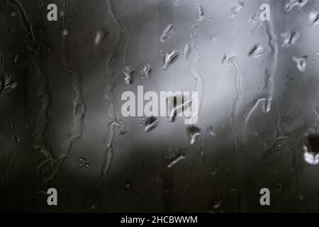 Raindrops on a Window -  Background Stock Photo