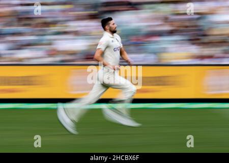 Melbourne, Australia. 27th Dec, 2021. Mark Wood of England bowls during day two of the Third Test match in the Ashes series between Australia and England at Melbourne Cricket Ground on December 27, 2021 in Melbourne, Australia. (Editorial use only) Credit: Izhar Ahmed Khan/Alamy Live News/Alamy Live News Stock Photo