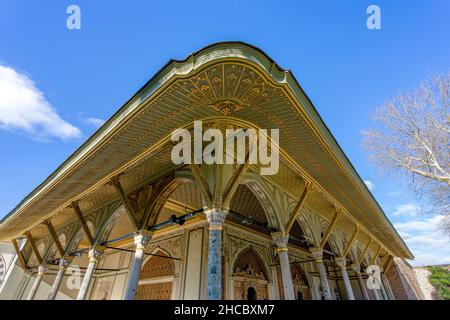 Detail of antique gilded ceiling decorations in gold-covered wood carvings in Istanbul Topkapi Palace. Stock Photo