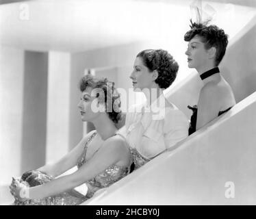 NORMA SHEARER, ROSALIND RUSSELL and JOAN CRAWFORD in THE WOMEN (1939), directed by GEORGE CUKOR. Credit: M.G.M. / Album Stock Photo