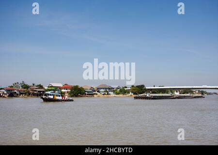 Asian thai worker people sailing barge and tugboat cargo ship delivery shipping in Chao Phraya or chaopraya river from Bangkok go to Ayutthaya old tow Stock Photo