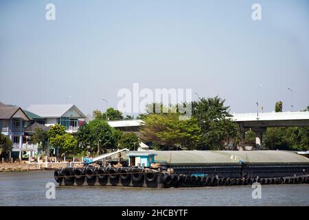 Asian thai worker people sailing barge and tugboat cargo ship delivery shipping in Chao Phraya or chaopraya river from Bangkok go to Ayutthaya old tow Stock Photo