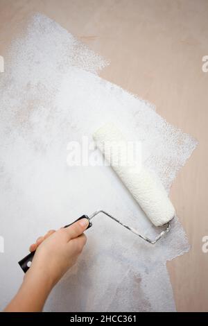 Painting on new plastered gypsum plaster Stock Photo
