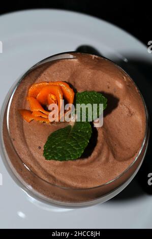 iced cocoa in a glass on wood background Stock Photo