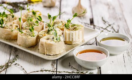 Food banner. Wheat sandwich rolls with chicken, cheese, cucumber, fresh herbs and salad. Tortilla deli wrap rolls with chicken ham and vegetable Stock Photo