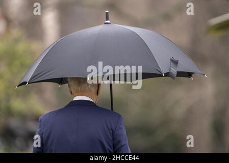 Washington, United States. 27th Dec, 2021. President Joe Biden walks out to Marine One on the South Lawn on his way to Delaware from the White House in Washington, DC on Monday, December 27, 2021. Photo by Ken Cedeno/UPI Credit: UPI/Alamy Live News Stock Photo