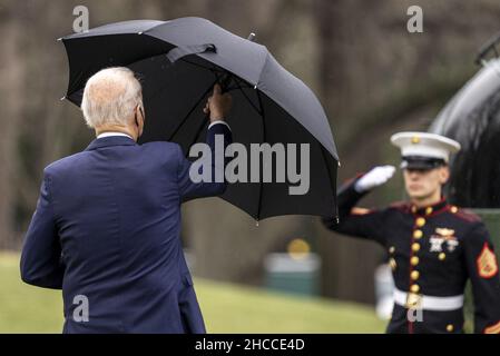 Washington, United States. 27th Dec, 2021. President Joe Biden walks out to Marine One on the South Lawn on his way to Delaware from the White House in Washington, DC on Monday, December 27, 2021. Photo by Ken Cedeno/UPI Credit: UPI/Alamy Live News Stock Photo