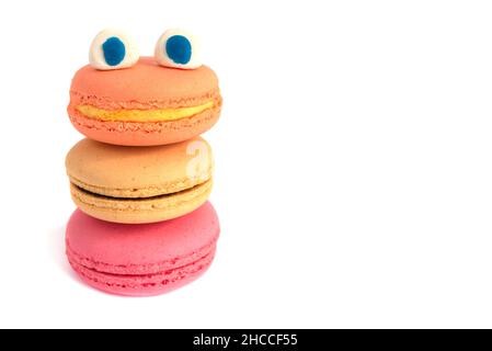 A funny monster with eyes made of macarons. Copy space Stock Photo