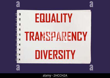 Equality transparency diversity words written on notepad on aquamarine background. Social concept of equality. Stock Photo
