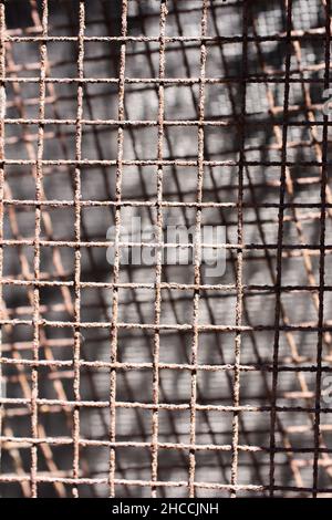 Vertical shot of a metal mesh texture background Stock Photo