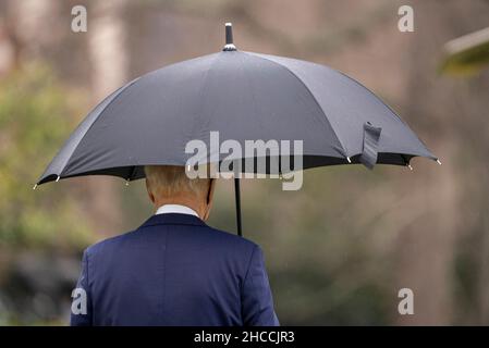 Washington, United States. 27th Dec, 2021. President Joe Biden walks out to Marine One on the South Lawn on his way to Delaware from the White House in Washington, DC on Monday, December 27, 2021. Photo by Ken Cedeno/Pool/Sipa USA Credit: Sipa USA/Alamy Live News Stock Photo