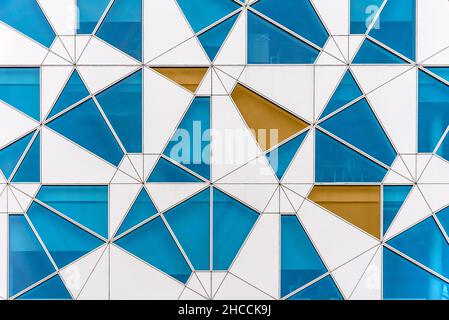 Oslo, Norway - August 11, 2019: Futuristic abstract facade of office building with irregular pieces of colored glass and aluminum. Barcode Project are Stock Photo