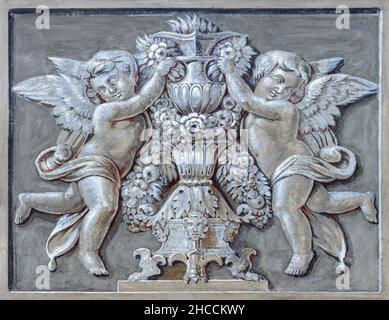 ROME, ITALY - AUGUST 28, 2021: The baroque fresco of angels in the church Chiesa dei Santi Vincenzo e Anastasio a Trevi. Stock Photo