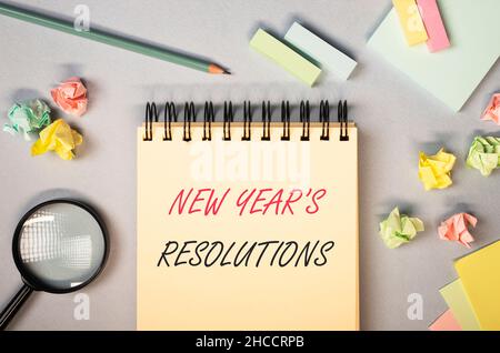 New Year s resolutions concept. Text on notebook. Stock Photo