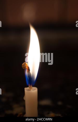 Selective focus shot of a lighted candle Stock Photo