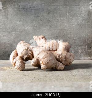 Closeup of ginger on a wooden surface Stock Photo