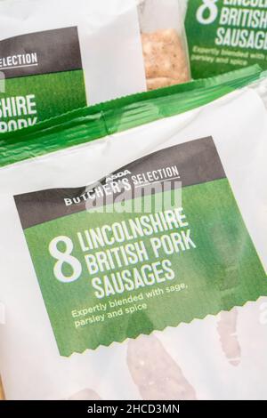 Label on packet of ASDA supermarket own-label Lincolnshire sausages. For plastic food packaging, convenience food. Stock Photo