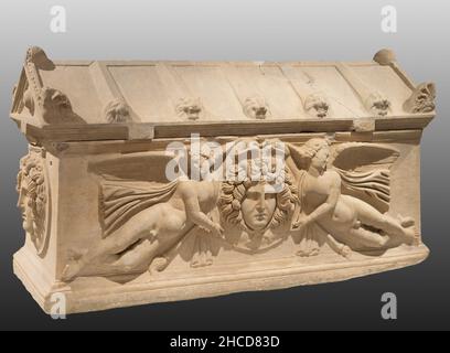 Ancient roman sarcophagus with reliefs of the head of Medusa's gorgon, Gorgoneion Stock Photo