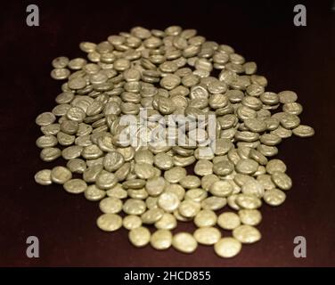 Treasury of ancient Greek silver coins on dark background Stock Photo