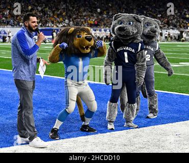 Detroit mascot Roary dressed in holiday attire stands on the sidelines  during an NFL football game between the Detroit Lions and the Arizona  Cardinals in Detroit, Michigan USA, on Sunday, December 19