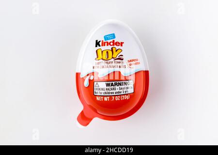 May 4, 2021. New York. Kinder joy milk chocolate egg on white background. Stock Photo